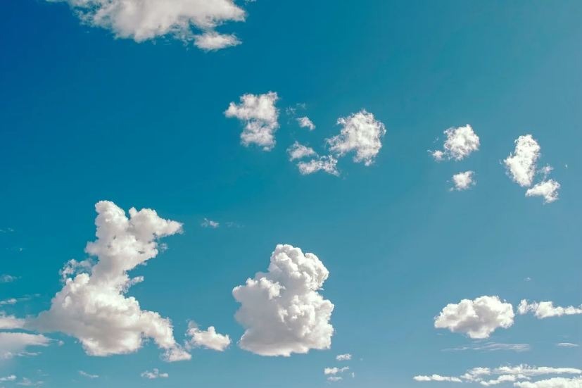 blue sky, small cumulus clouds
