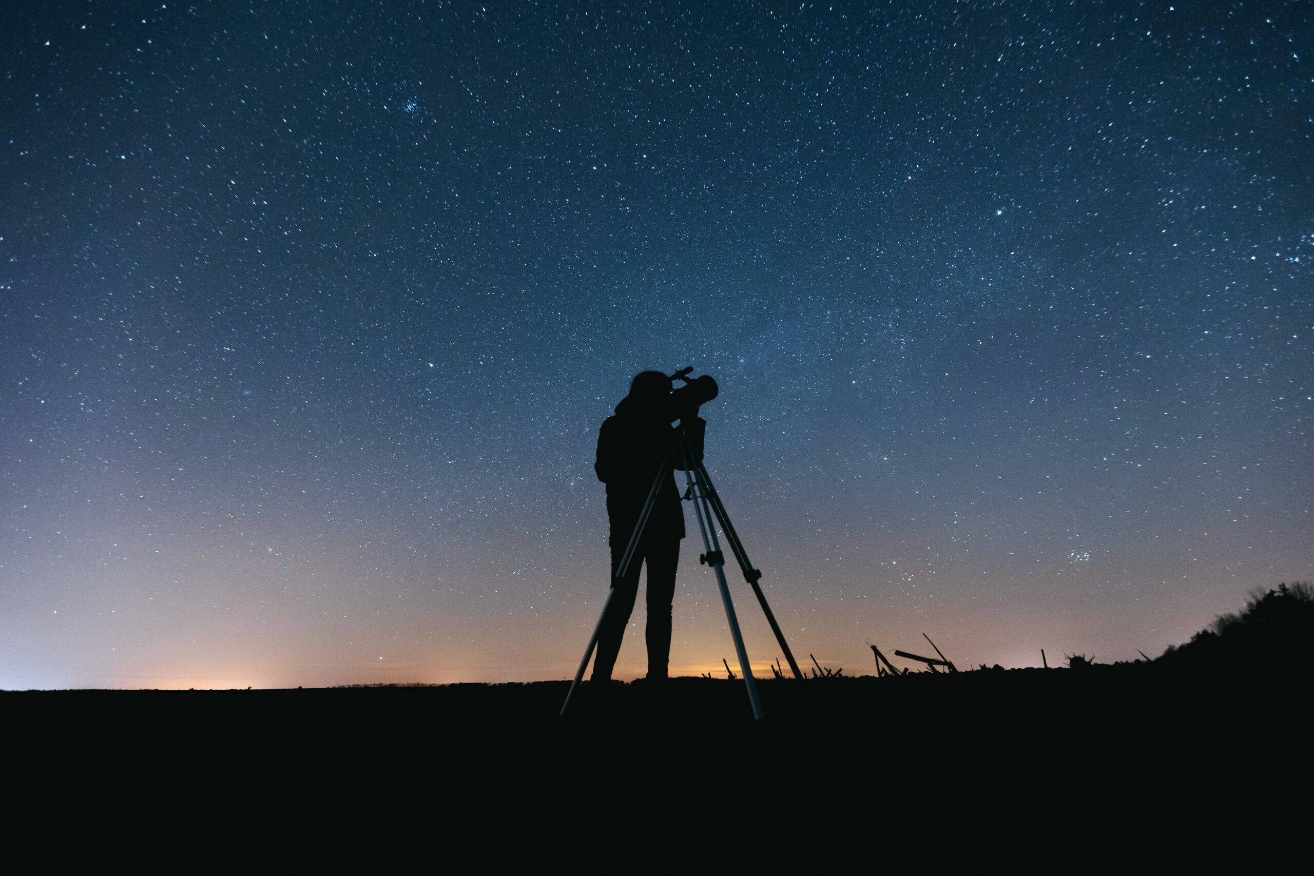 An-image-of-a-man-using-a-telescope