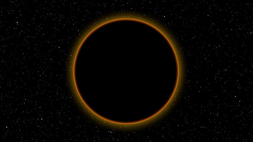 bright stars, black circle, yellow glowing light around the circle