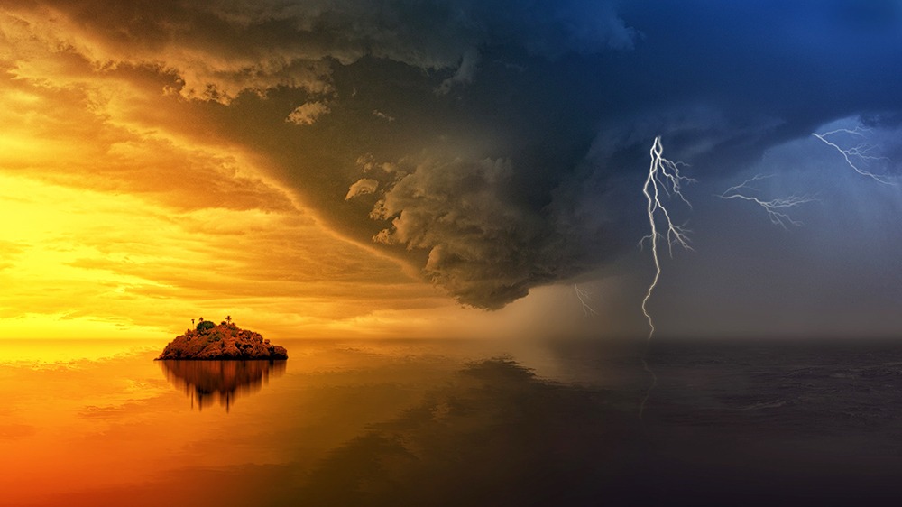 Island-in-sun-with-lightning-at-the-other-end-jpeg