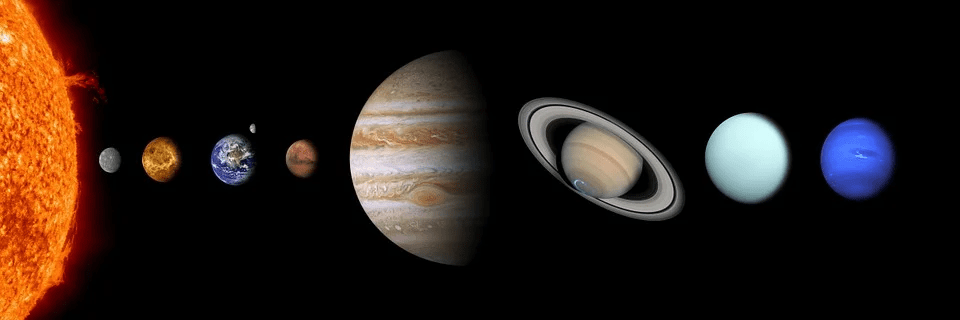 black background, 9 spherical objects in a straight line