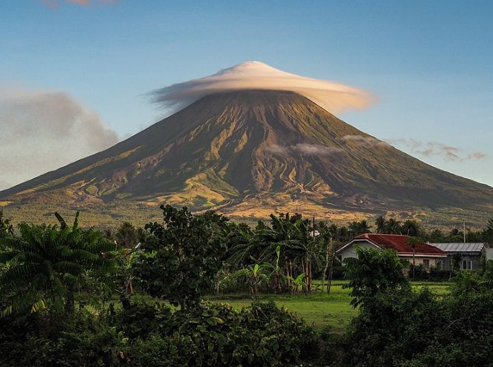 a lenticular cloud covering Mayon Volcano