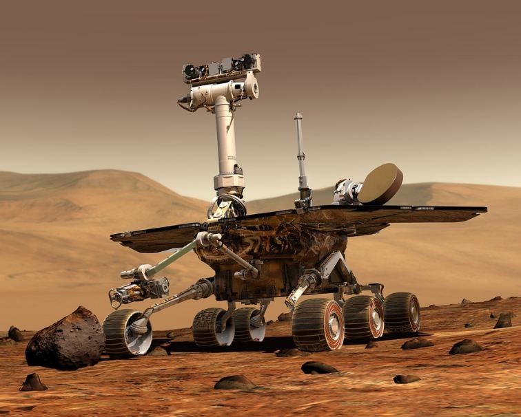 Mars Rover Vehicle traveling on Mars.
