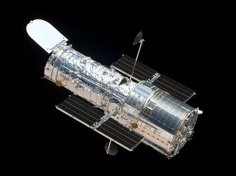 Seen in orbit from the departing Space Shuttle Atlantis in 2009, flying Servicing Mission 4 (STS-125), the fifth and final Hubble mission