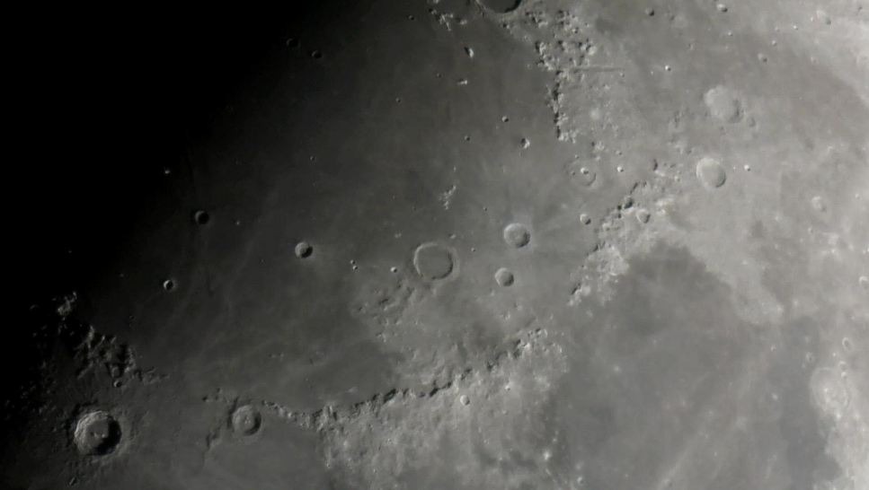 a-satellite-image-of-a-moons-craters