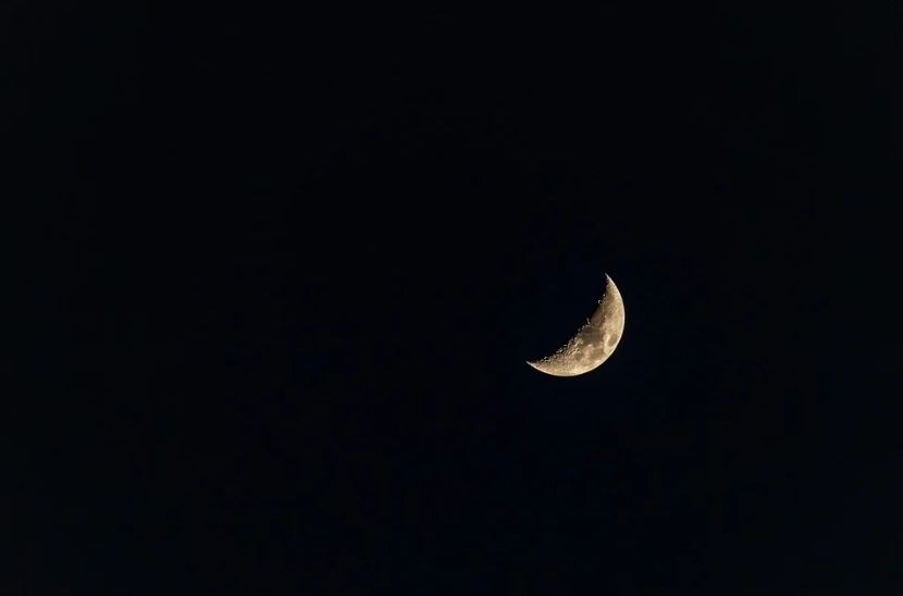 the night sky, half-moon